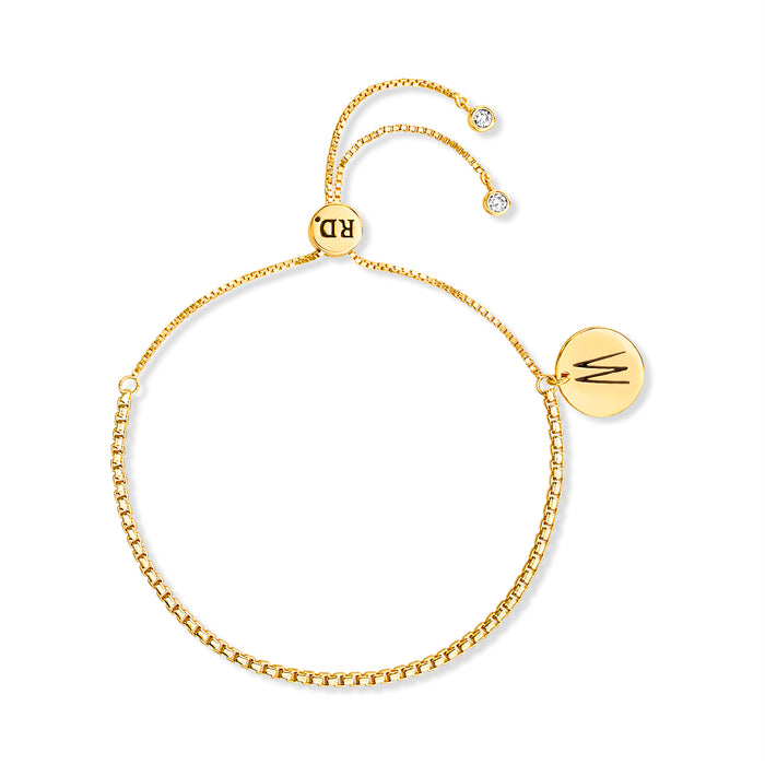 Rae Dunn initial disc bracelet in yellow gold plated brass with