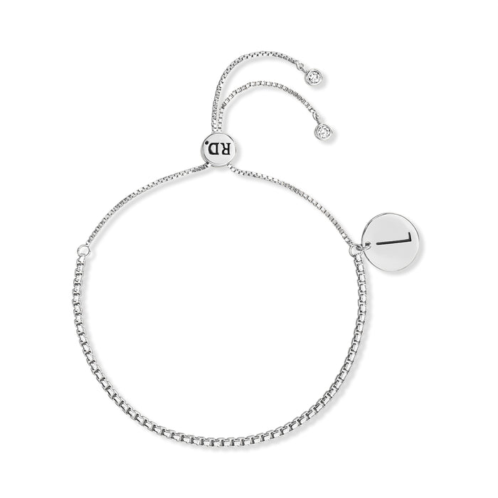 Rae Dunn initial disc bracelet in rhodium plated brass with cubic zirconia