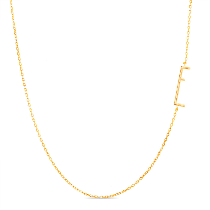 Rae Dunn asymmetrical initial necklace in yellow gold plated brass