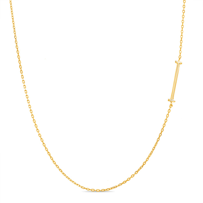 Rae Dunn asymmetrical initial necklace in yellow gold plated brass