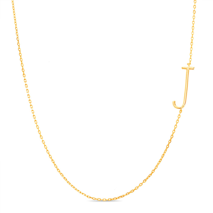 Rae Dunn asymmetrical initial necklace in yellow gold plated brass