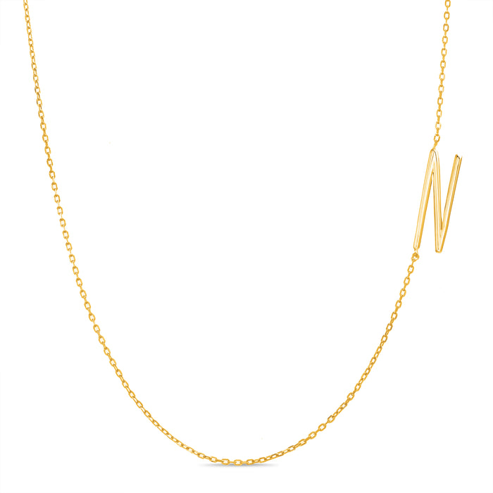 Rae Dunn asymmetrical initial necklace in yellow gold plated brass