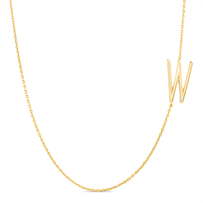 Rae Dunn asymmetrical initial necklace in yellow gold plated brass