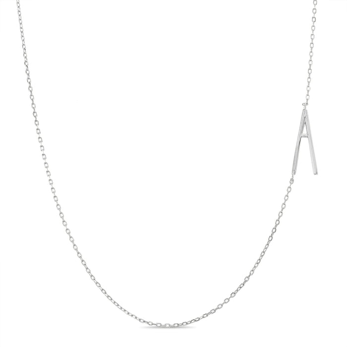 Rae Dunn asymmetrical initial necklace in rhodium plated brass