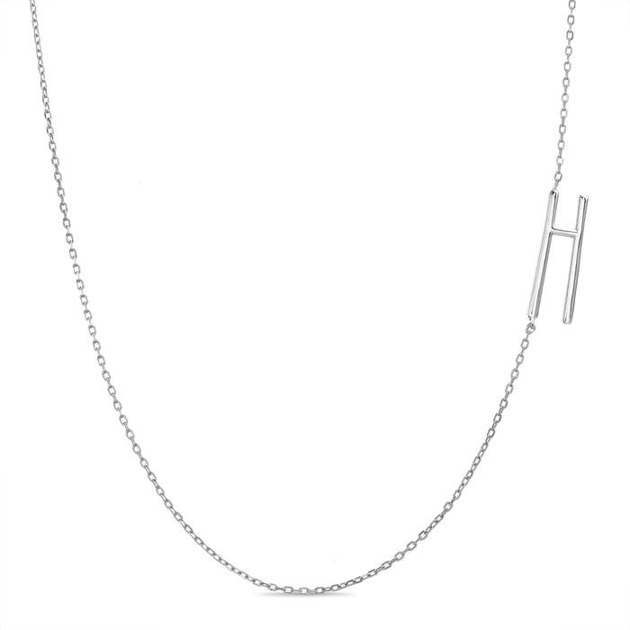 Rae Dunn asymmetrical initial necklace in rhodium plated brass