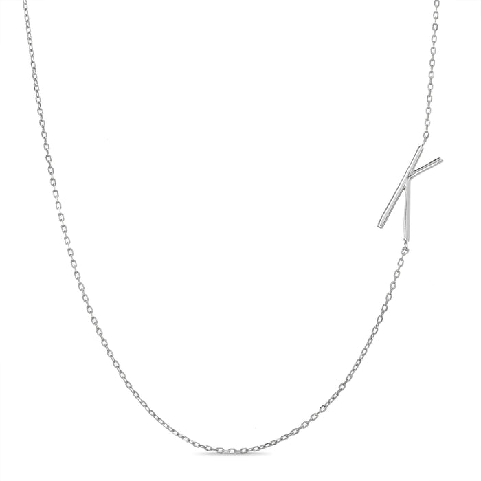 Rae Dunn asymmetrical initial necklace in rhodium plated brass