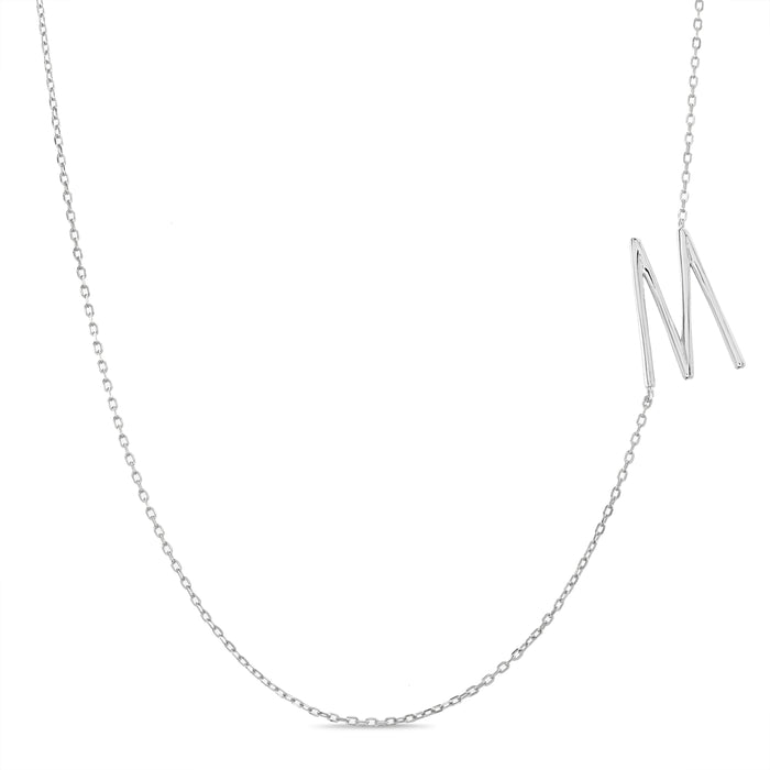 Rae Dunn asymmetrical initial necklace in rhodium plated brass