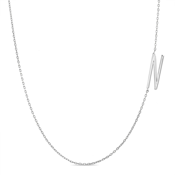 Rae Dunn asymmetrical initial necklace in rhodium plated brass