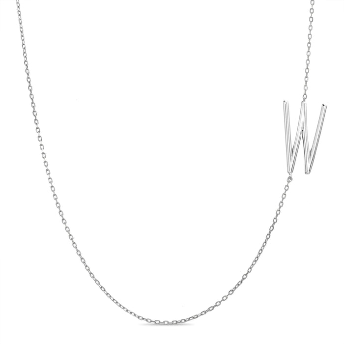 Rae Dunn asymmetrical initial necklace in rhodium plated brass