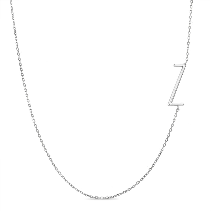 Rae Dunn asymmetrical initial necklace in rhodium plated brass